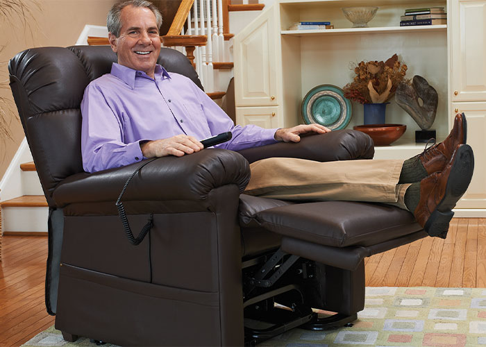 Image of a man sitting in a lift chair